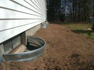 grade water away from foundation prevent mold removal Indianapolis
